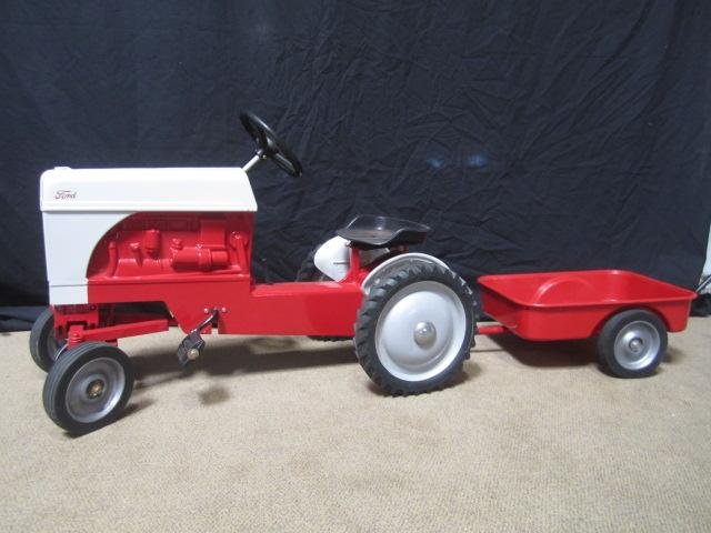 G21-8 REPLICA FORD TRACTOR WITH WAGON: "1954 Ford Jubilee". Estimate $300 - $700 Starting Bid $100