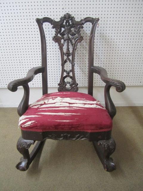 A44-16 MAHOGANY ROCKING CHAIR: Needs to be reupholstered. Estimate $100 - $200 Starting Bid $40