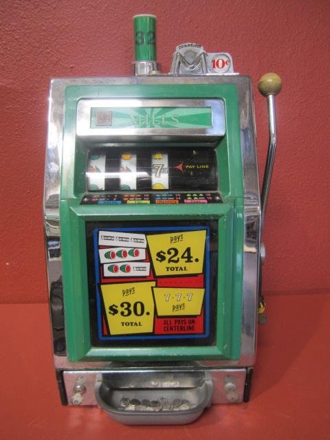 E82-2 MILLS 10 CENT SLOT MACHINE: All in working condition. Estimate $400 - $800 Starting Bid $200