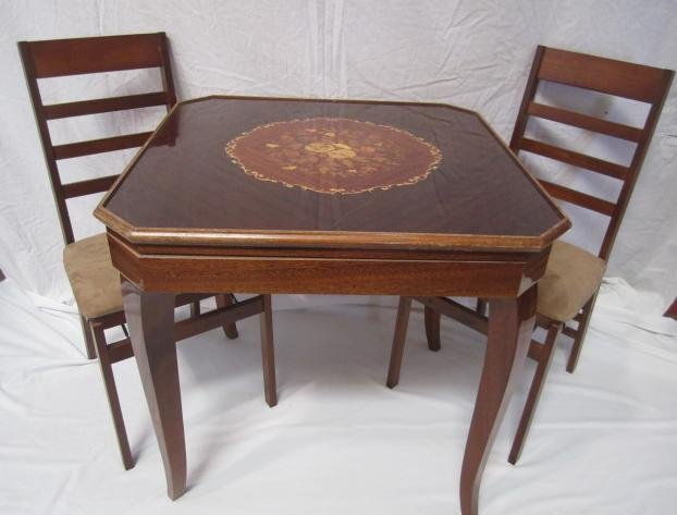 G78-1 WALNUT GAME TABLE WITH TWO CHAIRS: Many different games (see pictures). Measures 30" tall x 30 1/2" squared top. Estimate $500 - $900 Starting Bid $200