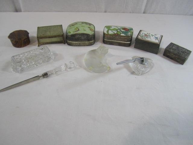 G77-10 GROUP OF TEN ASSORTED ITEMS: Including six boxes, crystal letter opener, Waterford crystal card holder, crystal pen, and Lalique crystal cat. Estimate $100 - $200 Starting Bid $50