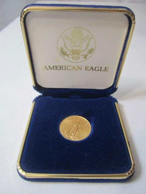 G77-11 AMERICAN EAGLE TEN DOLLAR GOLD COIN: 1999 1/4 ounce of gold. Estimate $500 - $700 Starting Bid $375