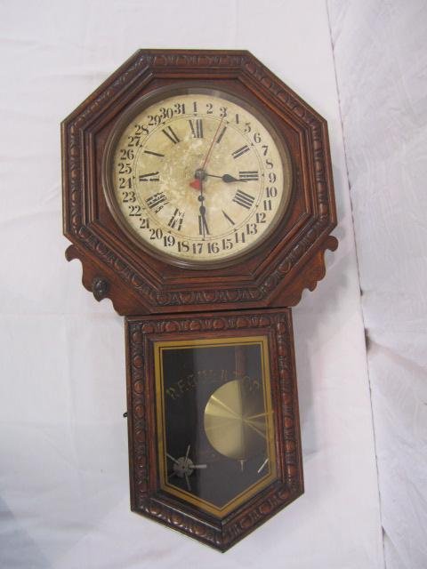 E33-35 NEW HAVEN WALL CLOCK: Measures 33' Long x 18' Wide. Estimate $100 - $200. Starting Bid $50.
