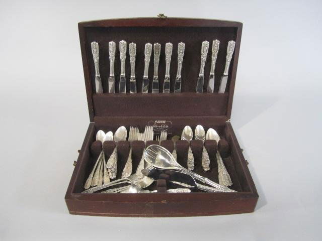 H18-2 WESTMORLAND MILBURN 100PC STERLING SET: Rose Pattern 1940 with original case. Set includes 11 knives, 11 forks, 8 salad / dessert forks, 24 teaspoons,11 table spoons, 8 beverage spoons, 7 butter knives, 7 condiment forks, 4 large serving sp