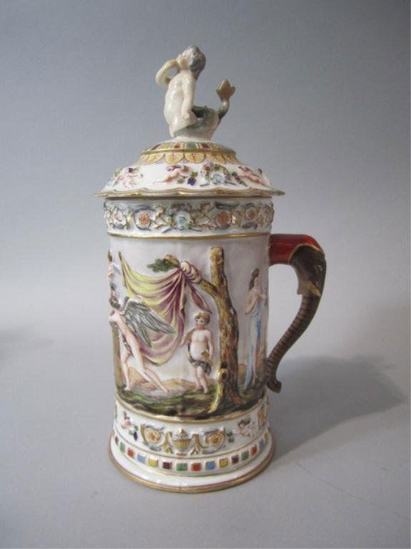 NY10 CAPODIMONTE STEIN: 19th century. Measures 13" tall. Estimate $800 - $1,200 Starting Bid $300