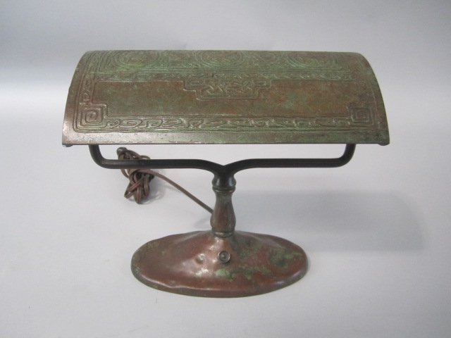A45-9 TIFFANY STUDIOS BRONZE ZODIAK DESK LAMP: Measures 9 1/4" tall x 9 1/4" wide. Estimate $2,000 - $3,000 Starting Bid $900