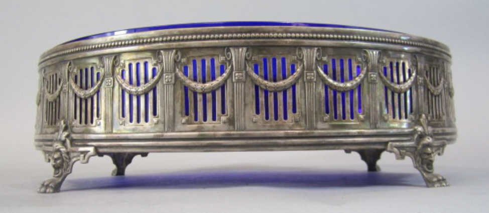 H80-241 SILVER JARDENIERE WITH COBALT BLUE INSERT: 19th century. Silver is Hallmarked (see picture). Measures 4 1/2" tall x 15" wide. Estimate $600 - $800 Starting Bid $300