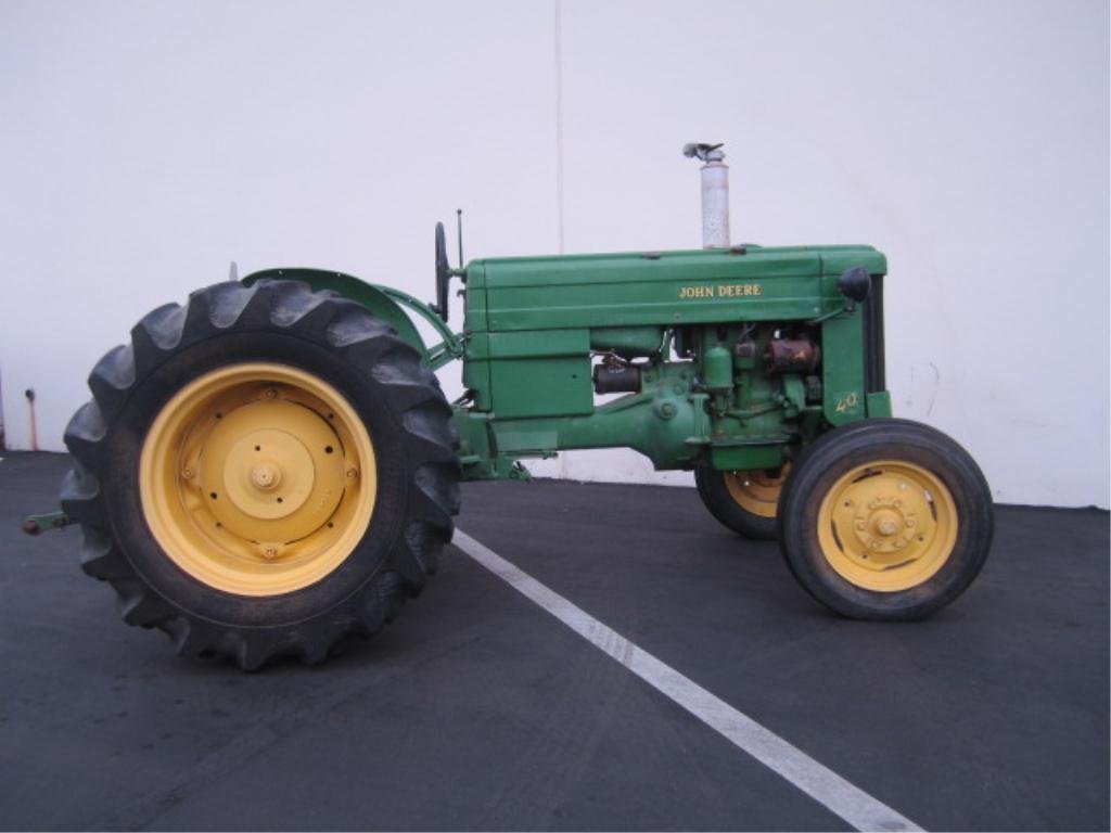 A3-1 VINTAGE 1953 JOHN DEERE TRACTOR: Comes with 5 accessories (see pictures). Fully restored with original John Deere parts. All in working order. Estimate $5,000 - $7,000 Starting Bid $900