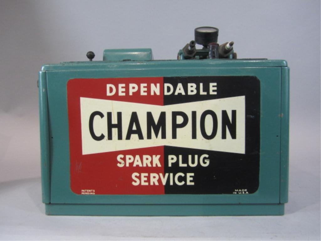 A3-14 VINTAGE CHAMPION SPARK PLUG SERVICE: Measures 16" tall x 19" wide x 14" deep. Estimate $300 - $500 Starting Bid $100