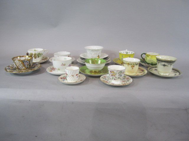 H80-304 SET OF 12 ASSORTED CUPS & SAUCERS: Including Meissen, Capodimonte, Dresden, KPM, Coal Port and Minton. Estimate $100 - $250 Starting Bid $50