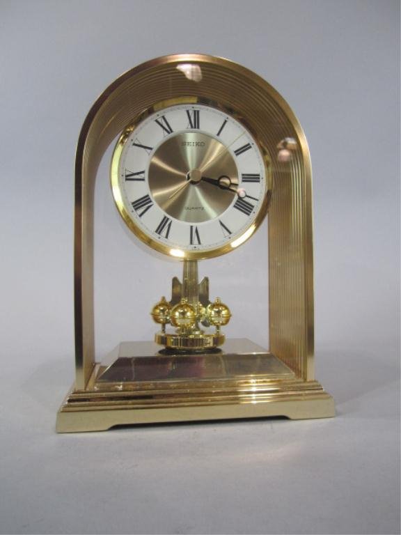 H25-106 ANNIVERSARY SEIKO CLOCK: Measures 9" tall x 7" wide x 4" deep. Estimate $100 - $200 Starting Bid $50