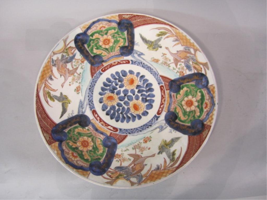 H32-5 ANTIQUE IMARI CHARGER: With birds and flower design. Measures 18" diameter. Estimate $200 - $800 Starting Bid $100