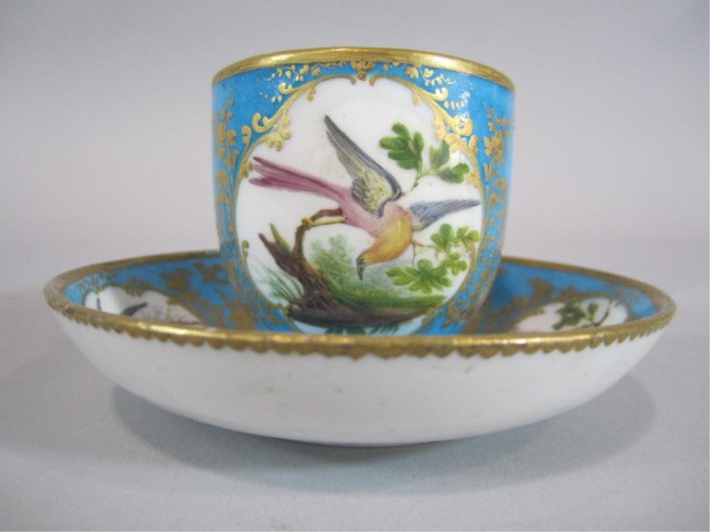 H63-6 SEVRES PORCELAIN CUP & SAUCER: Cup measures 2 1/4" tall and saucer 4 3/8" diameter. Estimate $200 - $400 Starting Bid $100