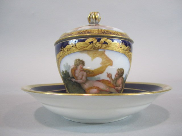 H63-8 MEISSEN PORCELAIN CUP & SAUCER: With lid. Cup measures 3 3/4"" tall and saucer 5 1/2" diameter. Estimate $200 - $400 Starting Bid $100