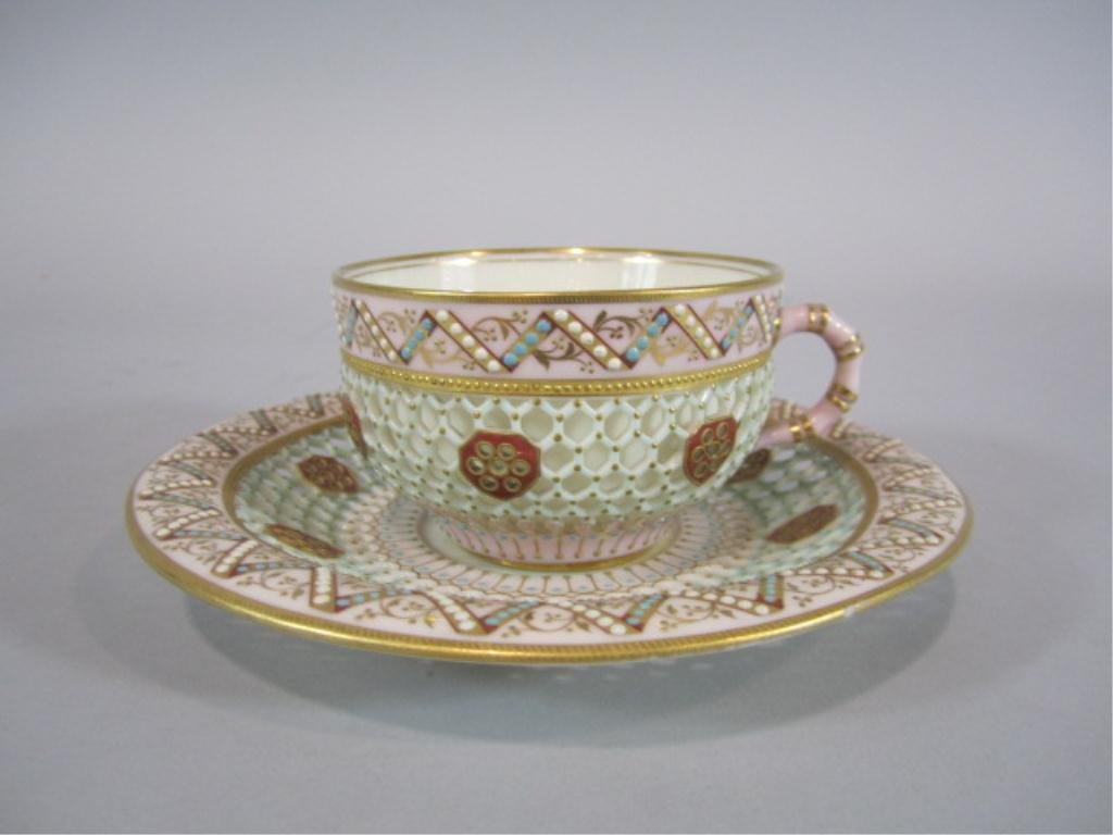H63-15 CUP & SAUCER: Marked on bottom (see picture). Cup measures 2 1/8" tall and saucer 4 3/4" diameter. Estimate $200 - $400 Starting Bid $100