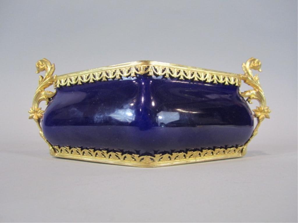 A9-25 SEVRES PORCELAIN CACHE POT: With ormolu. 19th century. Measures 3 1/2" tall x 8" wide. Estimate $200 - $300 Starting Bid $50