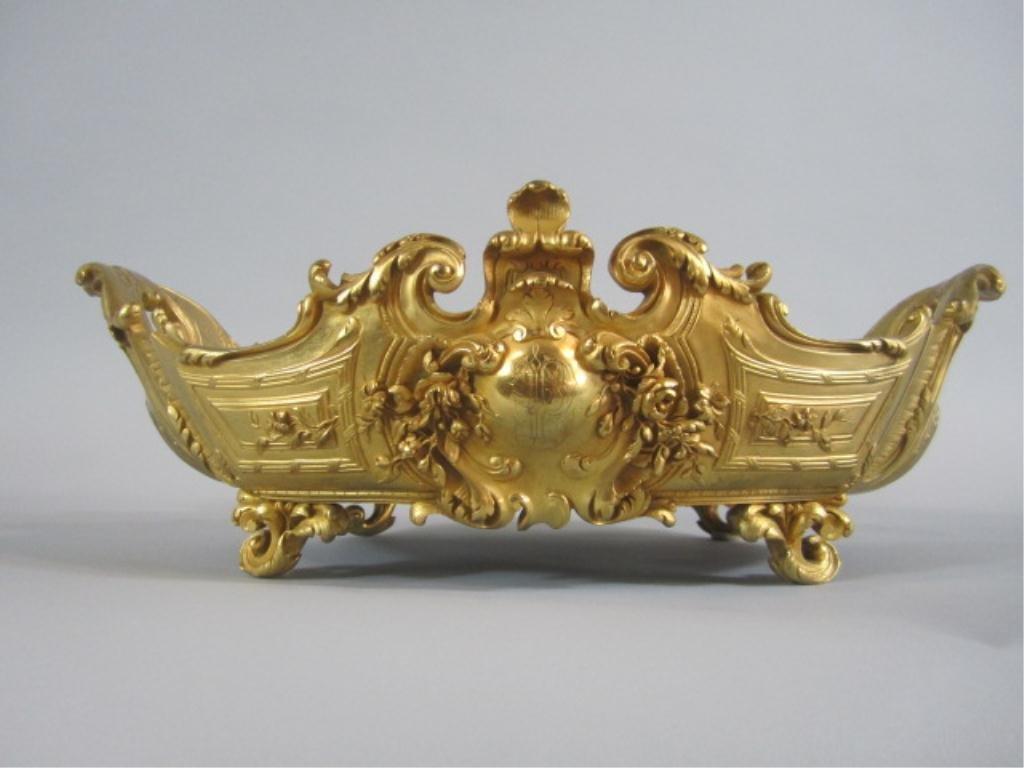 A83-8 ORMOLU CENTER PIECE: 19th century. Measures 6" tall x 20" wide x 13" deep. Estimate $800 - $2,600 Starting Bid $400