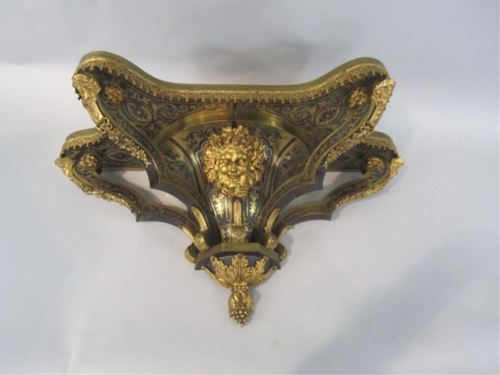 A32-4 MUSEUM QUALITY BOULLE WALL SHELF: With bronze ormolu masks. Measures 17 1/4" tall x 28" long x 11 1/4" deep. Estimate $2,000 - $4,000. Starting bid $800.