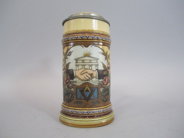 A78-66 METTLACH FREE MASON STEIN: Measures 8" tall. Good condition. Estimate $400 - $700 Starting Bid $200