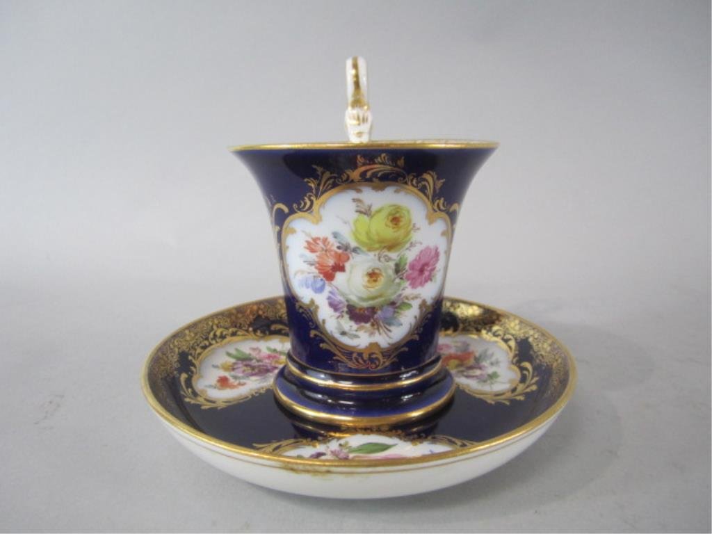 K1-23 MEISSEN CUP & SAUCER: Cup measures 4" tall and saucer 5" diameter. Estimate $600 - $900 Starting Bid $300