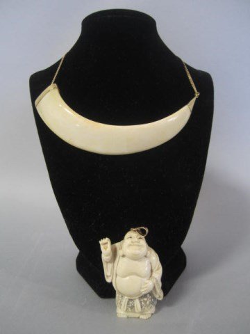 A35-2 IVORY NETSUKE PENDANT & BONE NECKLACE: Ivory pendant with 14k gold clasp and bone necklace with 18k gold chain. Necklace measures 16" long and Netsuke 2" tall. Good condition. Estimate $300 - $400 Starting Bid $100