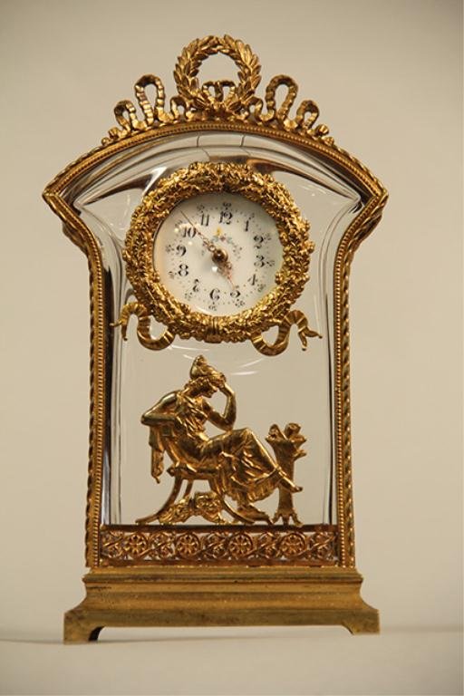 A44-10 DORE BRONZE & CRYSTAL DESK CLOCK: Measures 7" tall. Good condition. Estimate $800 - $1,200 Starting Bid $200