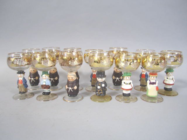 J3-1 COLLECTION OF 13 GOEBEL ETCHED WINE GLASSES: Including five Friar Tuck, one chimney sweeping, and seven black forest people. Measures 5 1/2" tall. One has crack. Estimate $200 - $500 Starting Bid $40