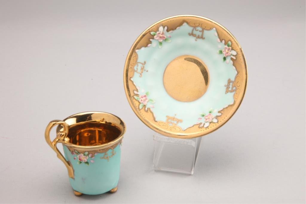 H77-7 ROYAL VIENNA CUP & SAUCER: Cup measures 2 1/2" and saucer 4 1/2" diameter. Good condition. Estimate $300 - $500 Starting Bid $100