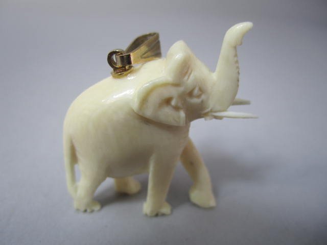 H44-2 TWO CARVED IVORY PENDANTS - 3