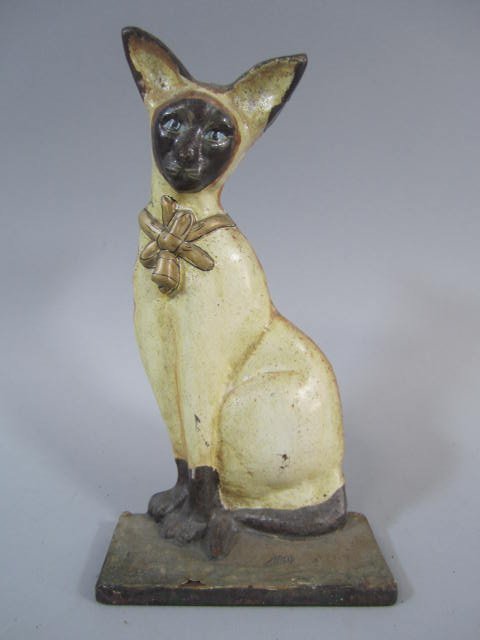 A77-9 Siamese Cat Cast Iron Door Stop: Signed on back. Measures 9" tall. Good condition Estimate $50 - $150 Starting Bid $20