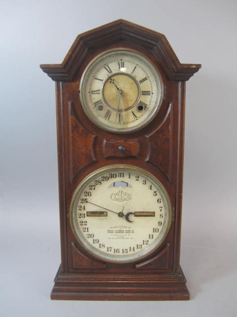 C78-16 Ithaca Calendar Clock: Measures 22 1/2" tall. Good condition. Estimate $300 - $400 Starting Bid $50