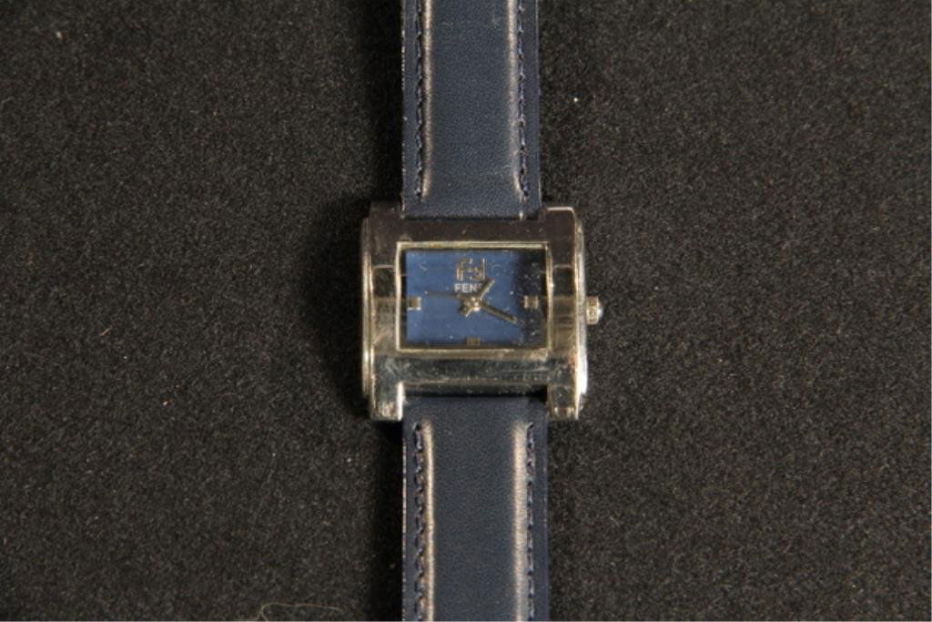 J13-3 Fendi Swiss Watch: With leather band. Good condition. Estimate $300 - $400. Starting Bid $50