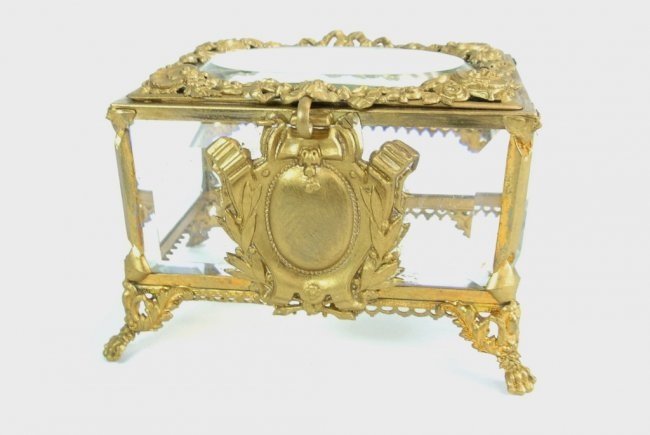 A DORE BRONZE JEWELRY BOX: A dore bronze and bevelled glass jewelry box, measures 4.75"x 3.75" , circa 1900 Estimate $300-400