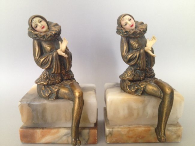 PAIR OF ART DECO STATUES BOOKENDS: Pair of art deco bronze and marble base statues, bookends 7.5" Estimate $400-500