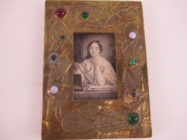 ART NOUVEAU JEWELED PICTURE FRAME: In The Manor Of Alfred Daguet. Measures 73/4" x 5 1/2". Estimate $400 - $600. Starting Bid $200.