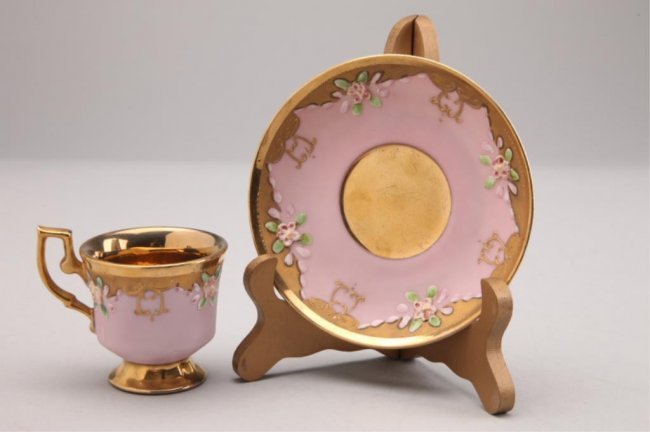 ROYAL VIENNA CUP & SAUCER SET: Cup measures 2 1/2" and saucer 4 3/4" diameter. Good condition. Estimate $200 - $300 Starting Bid $50