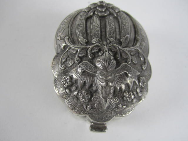 CHINESE SILVER MOTH BOX: Measures 1 5/8" tall x 2" x 2 1/2". Estimate $100 $200. Starting bid $50.