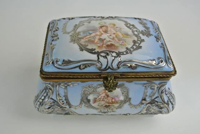 SEVRES BOX WITH SILVER OVERLAY AND HAND PAINTED: Measures 7 1/2" x 5". Estimate $800- 900. Starting Bid $600.