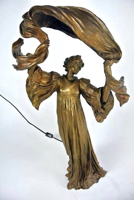 AGATHA LEONARD BRONZE SCARF DANCER: Art Nouveau gilt bronze Lamp, Early 20th century, signed A. Leonard Sclp .(AGATHA LEONARD 1841-1923 FRENCH), WITH FOUNDRY MARKS. Has been rewired. Measures 22 1/2" tall. Estimate $6,000 - 7,000. Start