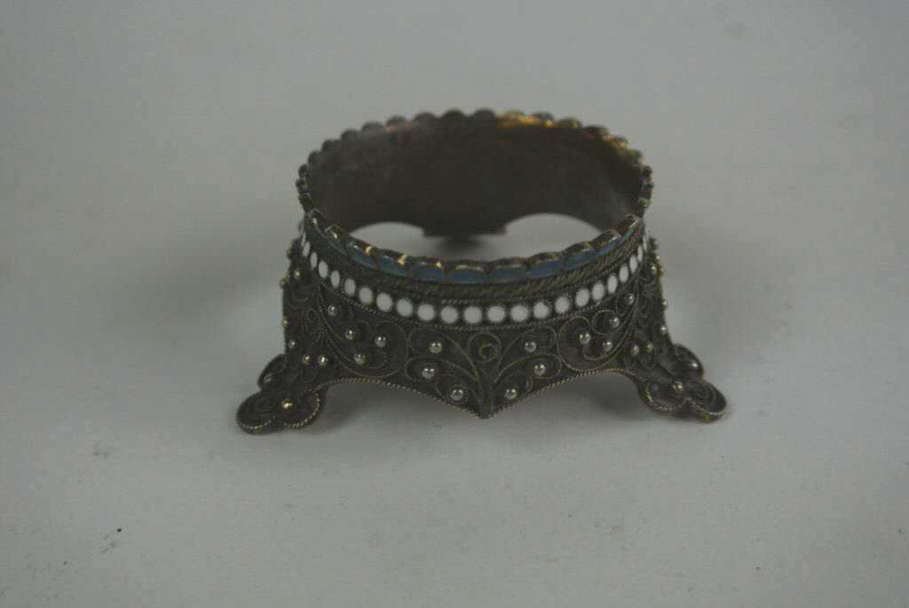 RUSSIAN SILVER AND ENAMEL EGG STAND: Marked 84 silver. Measures 1 3/4" diameter. Estimate $300- 400. Starting Bid $100.