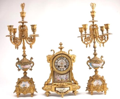 BH276 SEVRES 3PC CLOCK SET: Clock measures 13" and garnitures 20". Estimate $2,500 - $3,000 Starting Bid $10