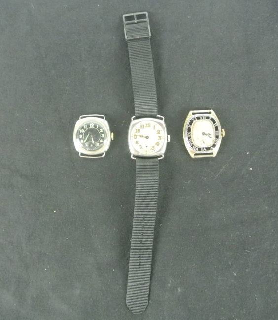 THREE WATCHES: Including 2 sterling watches and 1 Elgin enamel bezel watch. Estimate $200 - $400. Starting bid $10