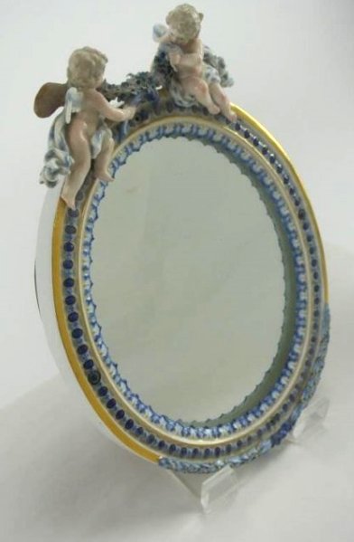 BH24 19TH CENTURY MEISSEN MIRROR: Broken wings, wings dont match piece. 13 1/2" x 10". Estimate $700- 900. Starting Bid $10.