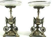 BH35 PAIR OF SILVER PLATE AND CUT GLASS TAZZAS: Measures 9 1/4" tall x 7" diameter. Estimate $1,500- 2,000. Starting Bid $10.
