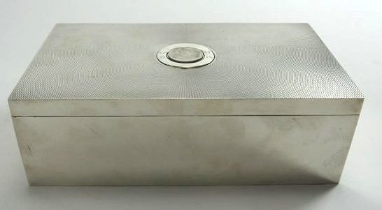 1865 ENGLISH ELKINGTON SILVER PLATE CIGAR BOX: Measures 3 1/4" tall x 10 1/8" long x 6" wide. Estimate $100- 200. Starting Bid $100.
