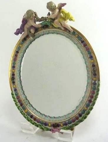 BH53 19TH CENTURY MEISSEN MIRROR: Measures13 1/2" x 10". Estimate $1,500- 2,000. Starting Bid $10.