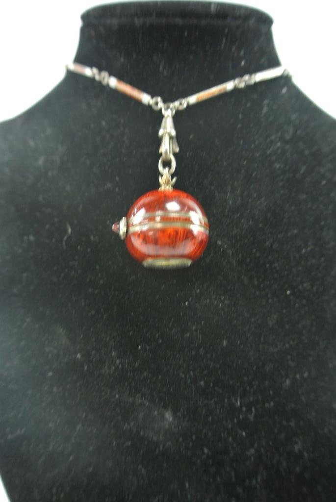 ART DECO BALL WATCH WITH MATCHING CHAIN: Estimate $300- 500. Starting Bid $300.