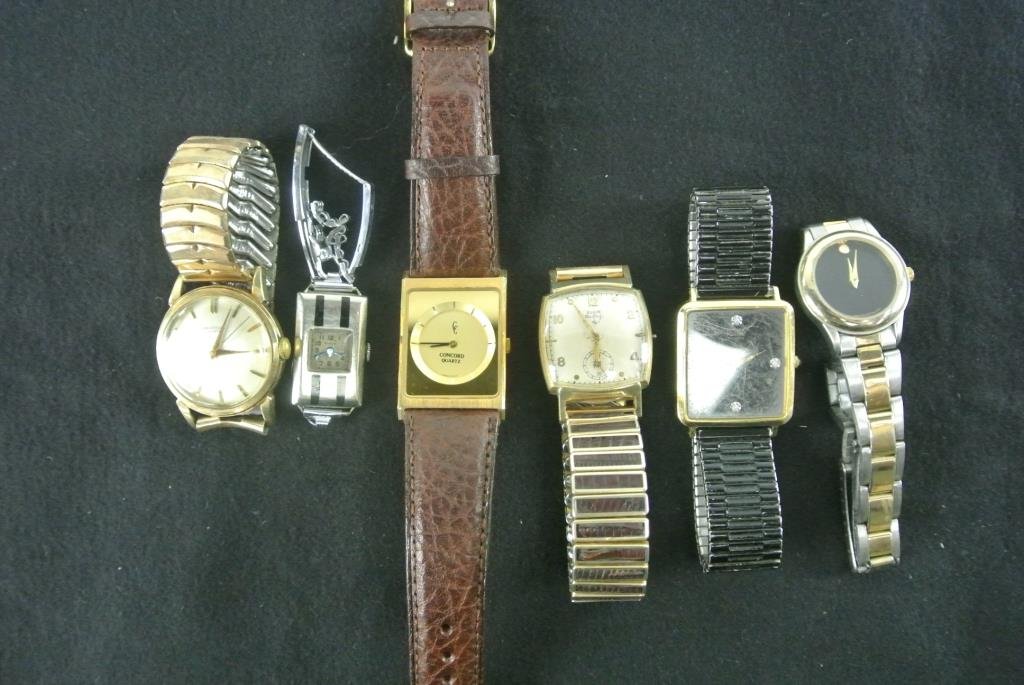 GROUP OF SIX WATCHES: Containing Universal geneve, 2 elgins, movado, concord and pulsar. Estimate $200- 300. Starting Bid $10.
