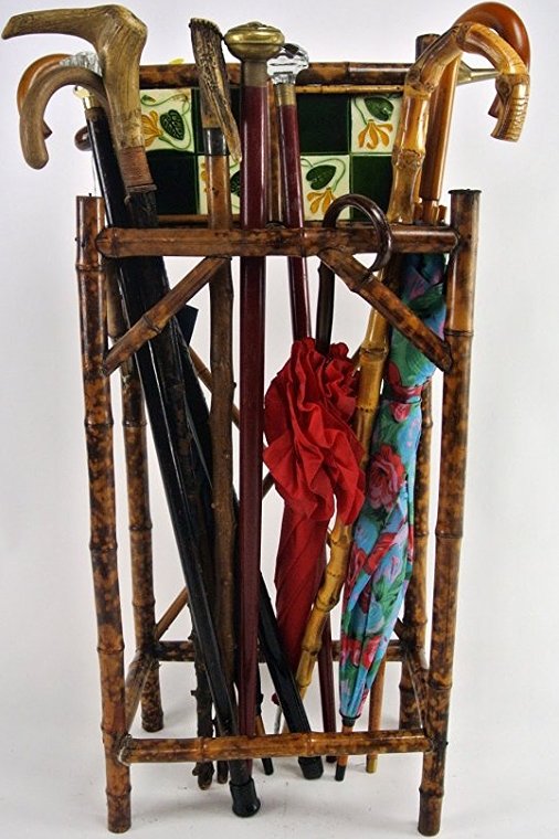VICTORIAN BAMBOO STAND, 9 CANES AND 3 UMBRELLAS: Bamboo stand has tile inserts. Estimate $200- 250. Starting Bid $25.