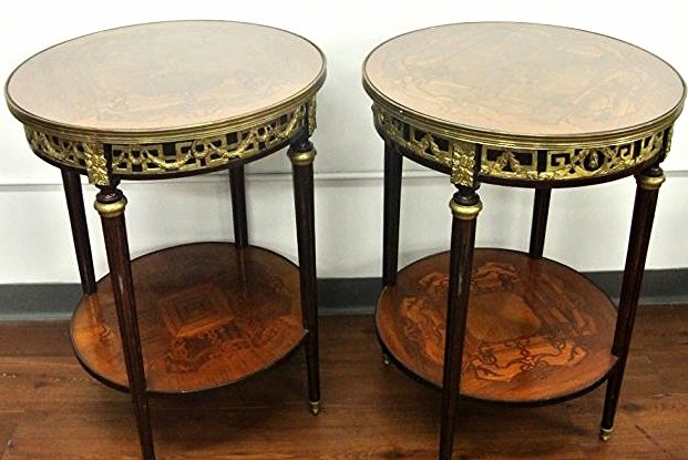 BH70 PAIR OF MARQUETRY & ORMOLU MOUNTED TABLES: Measures 31 1/4" tall x 23 1/2" diameter. Estimate $1,500- 2,000. Starting Bid $10.